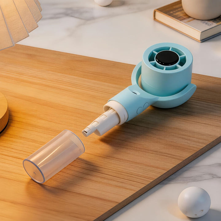Bærbar minivifte med spray for effektiv personlig kjøling, perfekt til sommeren.