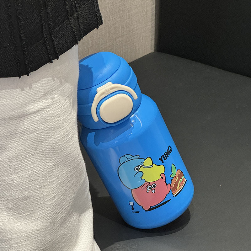 Dame vannflaske i rustfritt stål med morsomt tegneseriedesign. Bruk til jobb, trening og skole.
