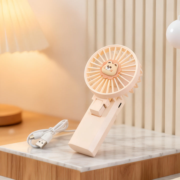 Bærbar USB-vifte med søt løve-design. En praktisk minivifte for å holde deg kjølig og komfortabel.