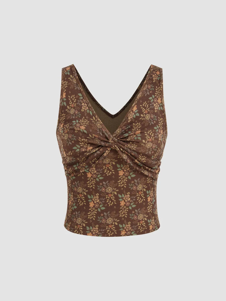 Elegant bordeaux festtopp med blomstermønster og flatterende rynker. En chic bluse for damer.
