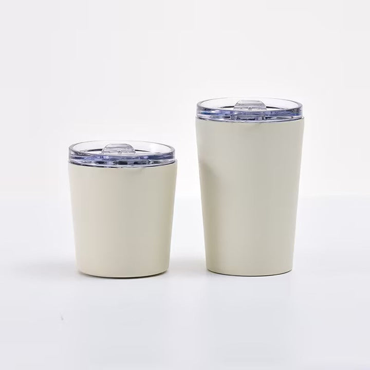Rosa termokopp med ergonomisk håndtak, lekkasjesikker og dobbelvegget for varm kaffe eller te hele dagen.