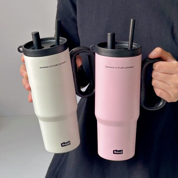 Kvinner termokopp i rustfritt stål, dobbelt system. Allsidig isolert flaske for kaffe på kontoret eller vann utendørs.