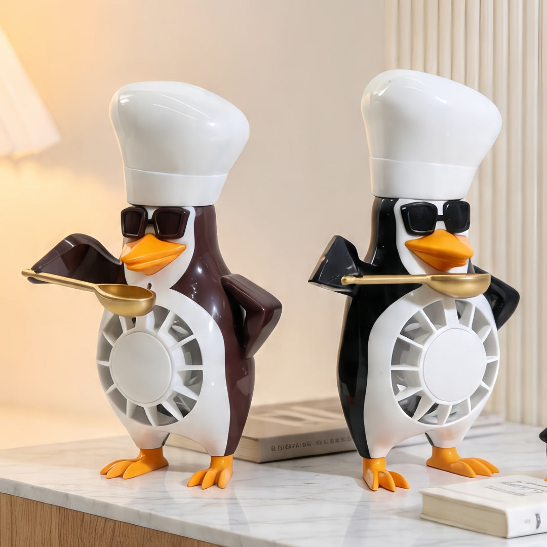 Stillegående USB bordvifte i kreativt pingvin-design, ideell for personlig kjøling og kontorbruk.