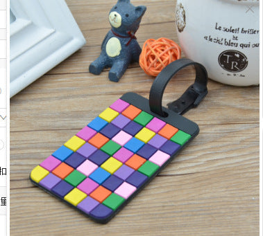 Fargerik silikon bagasjelapp med unikt mosaikkdesign, ideell for identifikasjon av koffert på reise.