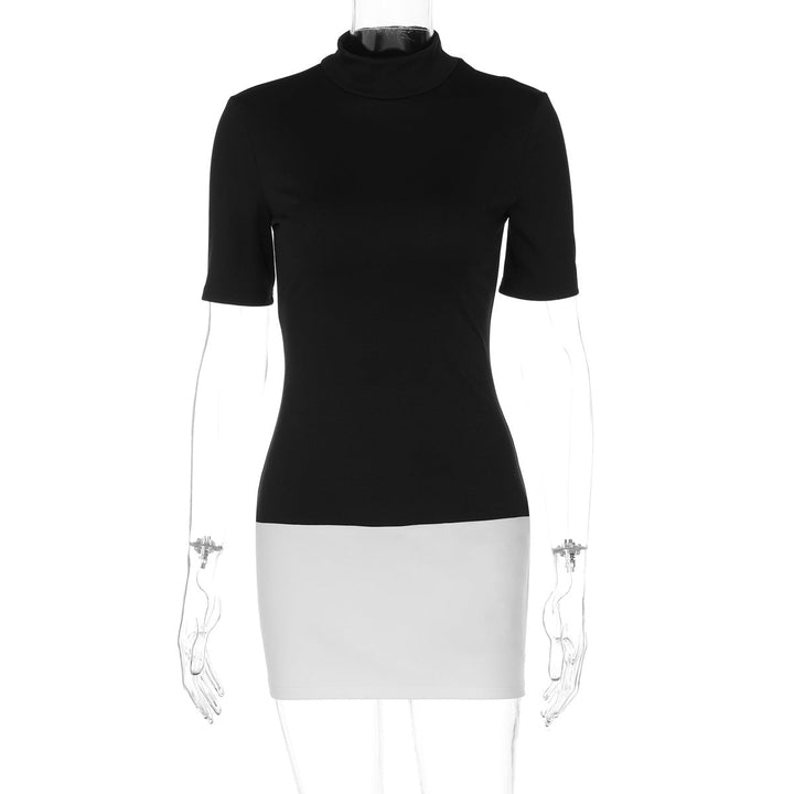 Trendy kortermet topp for dame med stilfull rullekrage. Elegant design for vår- og sommermote.