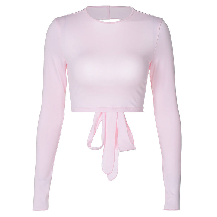 Allsidig dame topp, langermet og cropped. Perfekt som stilfull fritidsklær eller for en mer pyntet look.