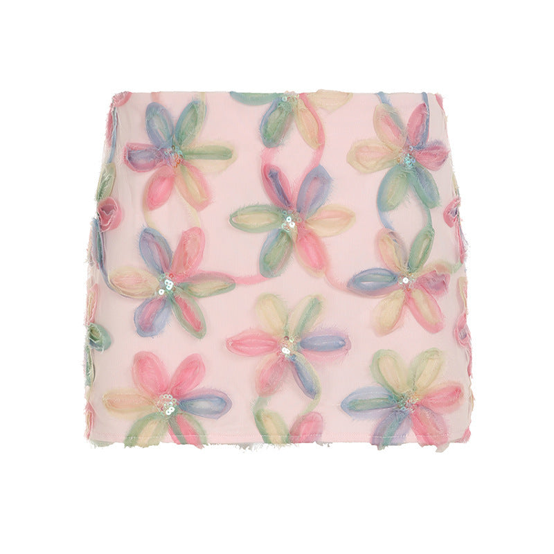 Søtt dame blomsterskjørt med glitrende finish og iøynefallende 3D-design, et must for trendy sommerklær.