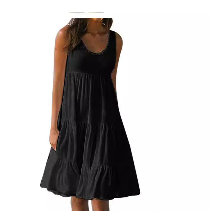 Elegant gul sommerskjole med diskrete volanger. Perfekt lett kjole for sommer og fritid.