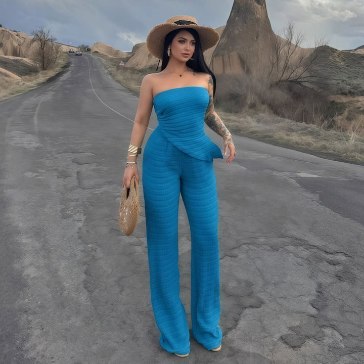 Trendy asymmetrisk jumpsuit for kvinner, off-shoulder design, ideell for både fest og strand.