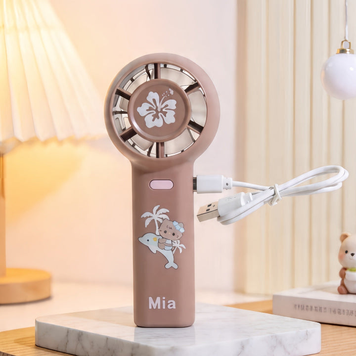 Bærbar håndholdt minivifte med søtt dyredesign i rosa. Perfekt personlig avkjøling for sommeren.