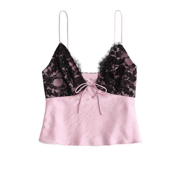 Trendy damebluse med spiss snitt, V-hals og knutedetalj. En elegant og allsidig topp for våren.