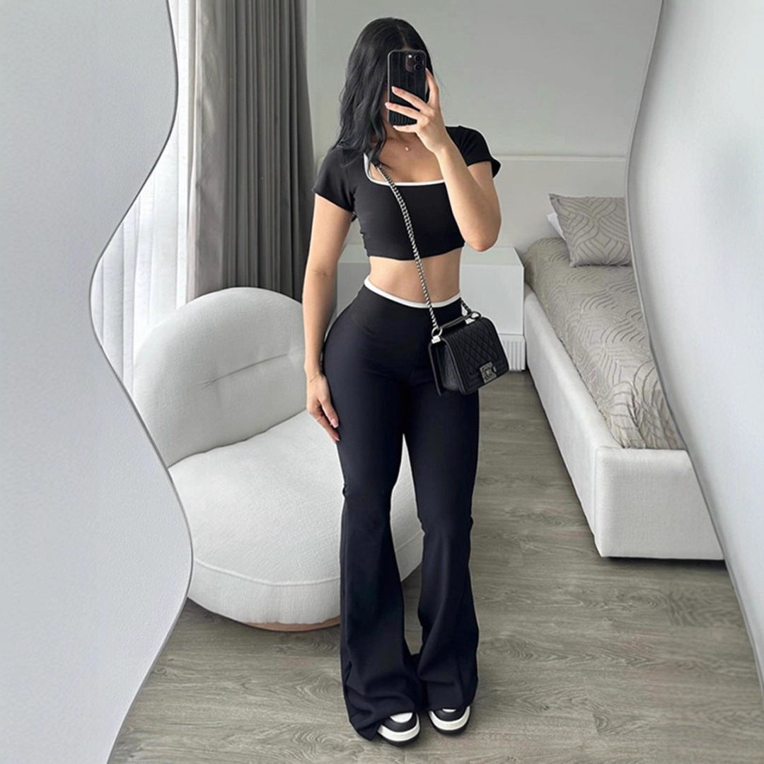 Stilig hvit crop-top i mykt stoff, del av et todelt sett for kvinner. Moderne og trendsettende sommerstil.