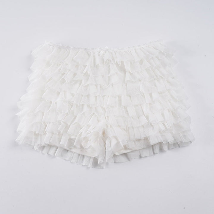 Allsidig dameshorts i lett stoff med volanger og elastisk midje, ideell for en aktiv sommer.