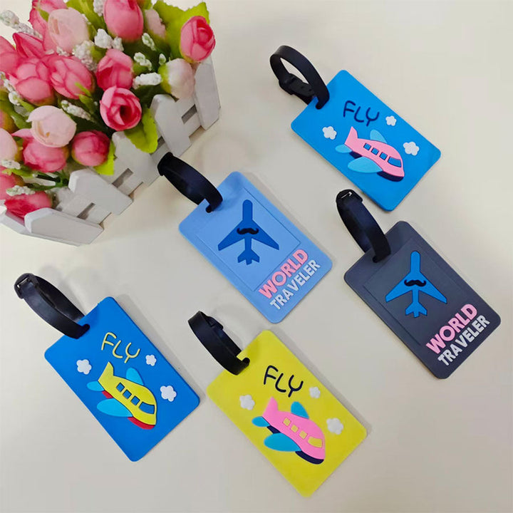 Gul silikon bagasjetag med unikt flymotiv, perfekt for reise og enkel koffertidentifikasjon.