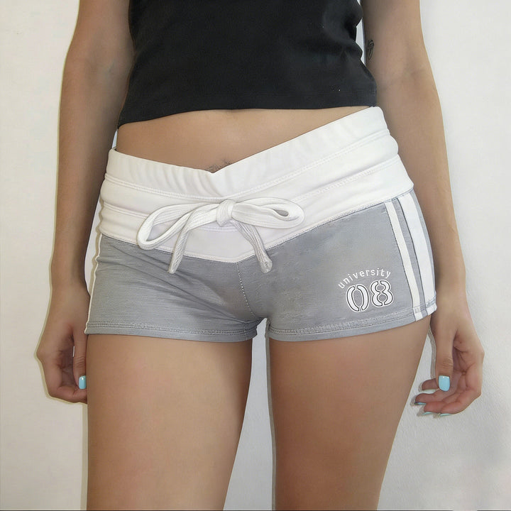 Dame fritidshorts med elastisk midje og snøring for komfortabel, casual sommerbruk.