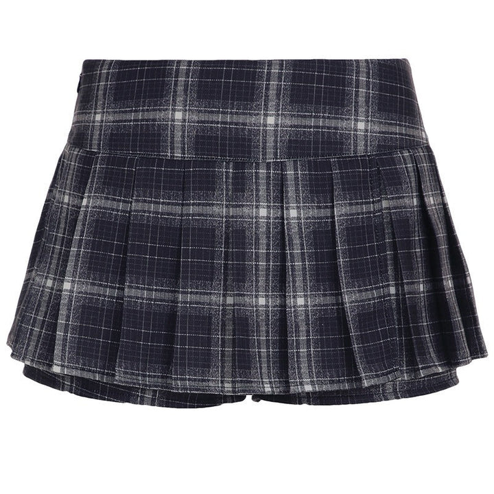 Dameskjørt: miniskjørt med vertikale striper og knapper. Trendy og komfortabelt for vår/sommer.