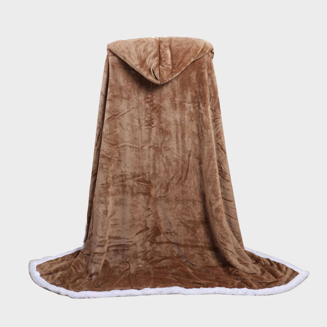 Elegant dame plysjteppe i dobbelt fleece, drapert på sofaen. Mykt og varmt fleecepledd som passer perfekt i stuen.