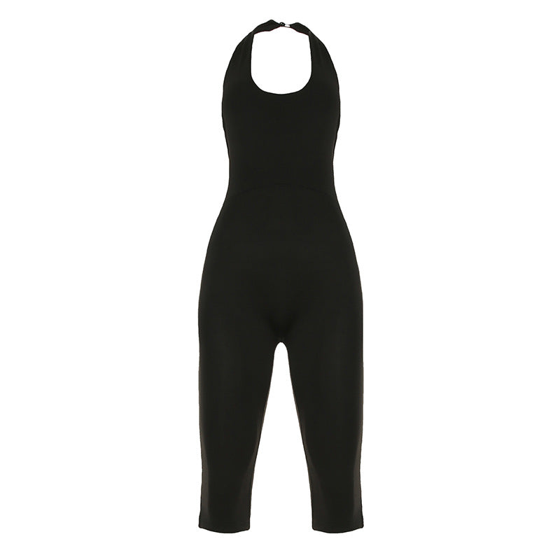 Chic, kroppsnær svart jumpsuit for kvinner med unik elegant ryggutskjæring. Ideell for fest og sommerkvelder.