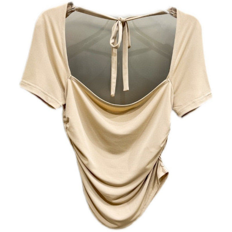 Trendy khaki damebluse med flatterende stretch og elegant åpen rygg. En moderne og komfortabel festtopp.