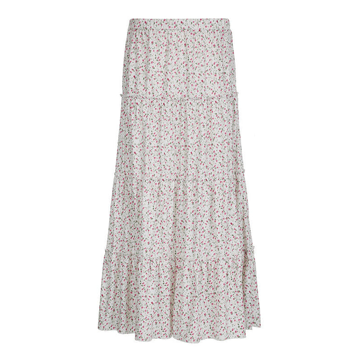 Langt, blomstret dame maxiskjørt med feminine volanger og elastisk midje. Ideelt for vår/sommer.