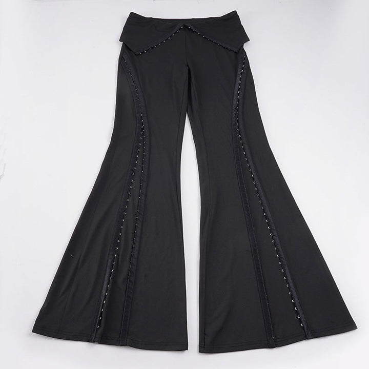 Dame flared bukser med trykknapper, elegant stylet for fest. Trendy og moderne komfortable bukser.