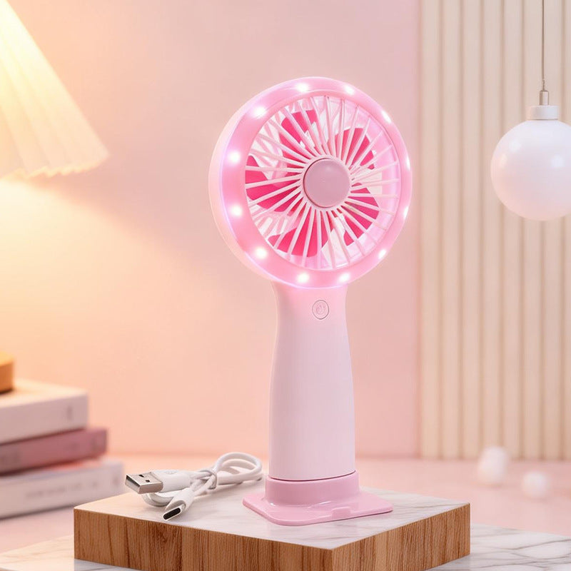 Ergonomisk håndvifte med LED-lys for kvinner, leverer umiddelbar kjøling og lysfunksjon.