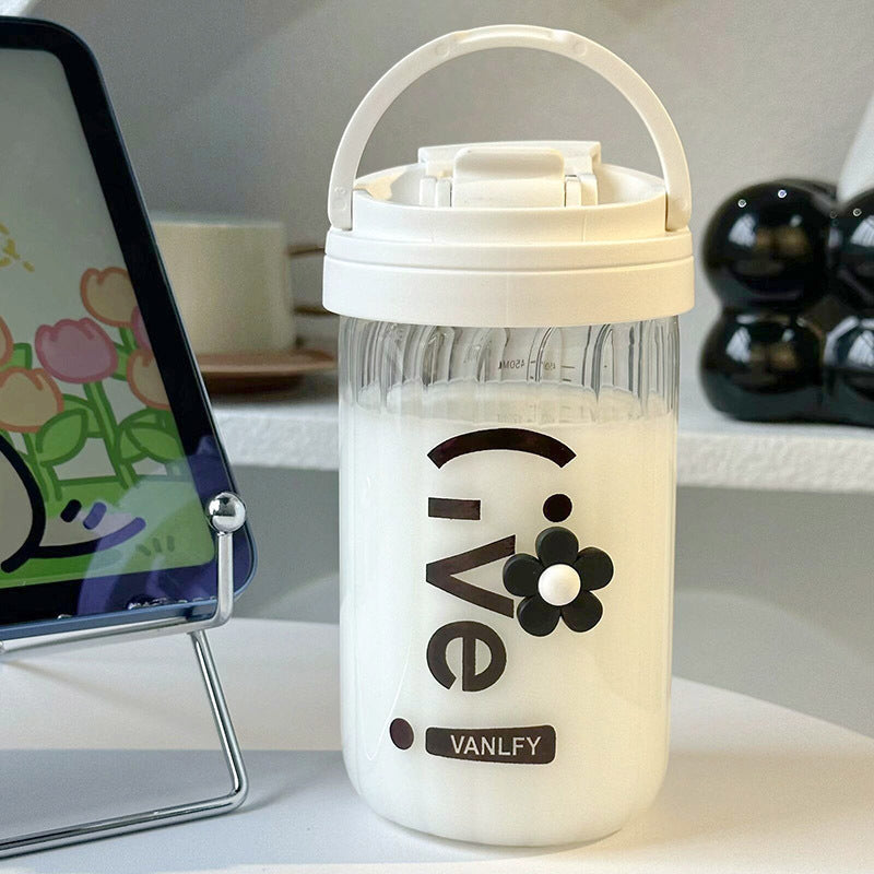Høykvalitets isolert 500ml kvinners drikkeflaske i hvit, med et vakkert og fargerikt blomsterdesign.