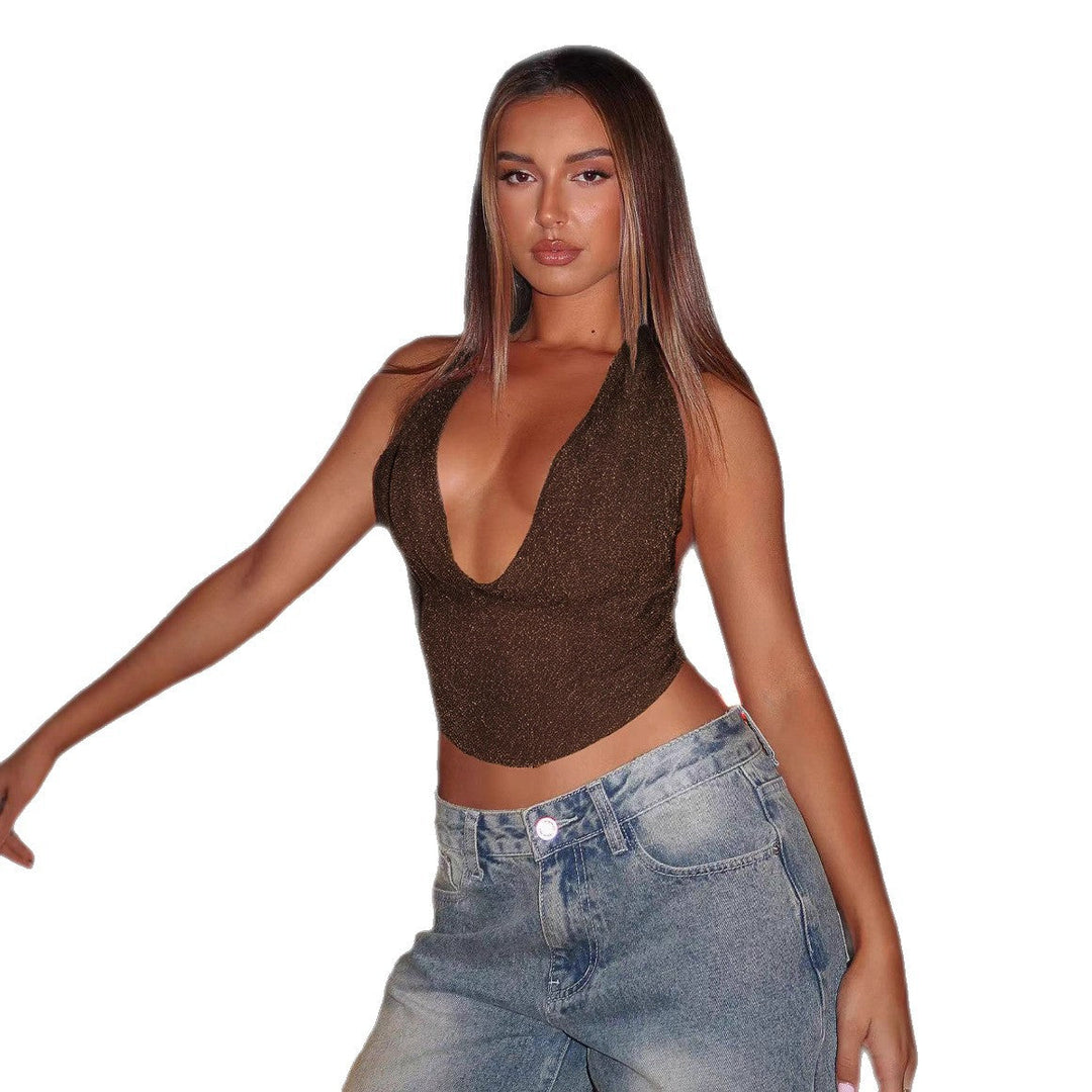 Moteriktig dame crop topp med dyp V-hals, perfekt som festtopp. Elegant og trendy for kveldsbruk.