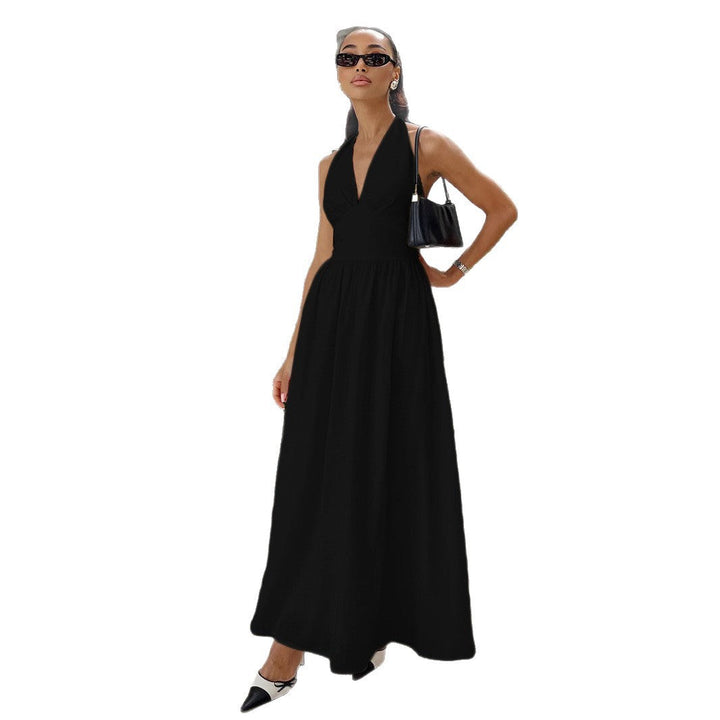 Nærbilde av stoffet på elegant dame maxikjole. Mykt og pustende, perfekt for sommer- og festkjoler.