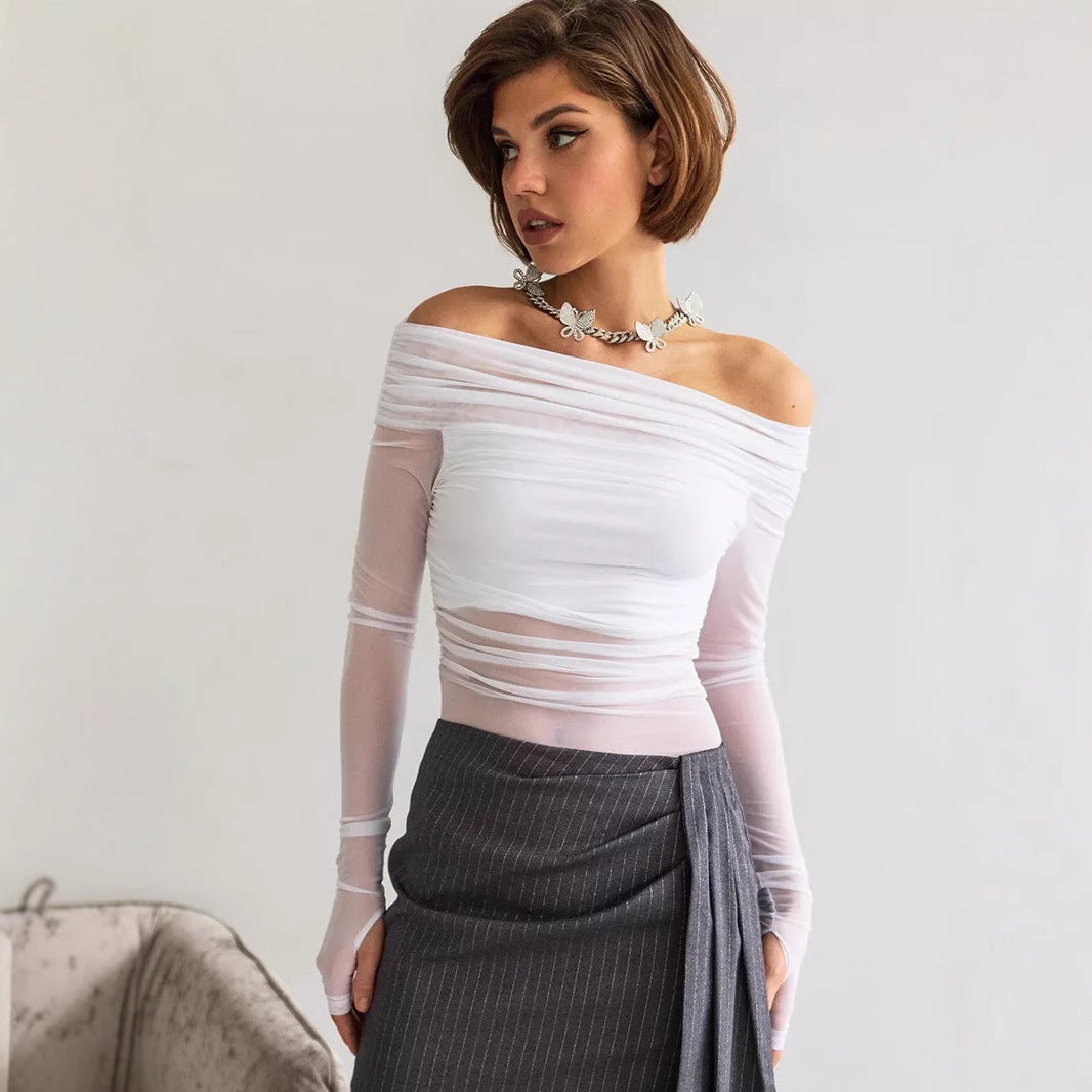 Stilfull off-shoulder langermet dametopp i klassisk design, ideell som festtopp eller elegant hverdagstopp.
