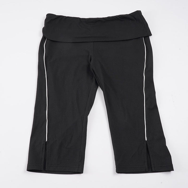 Sporty høytlivs capribukser til dame, perfekt for sommeren. Komfortable og stilige for aktiv fritid.