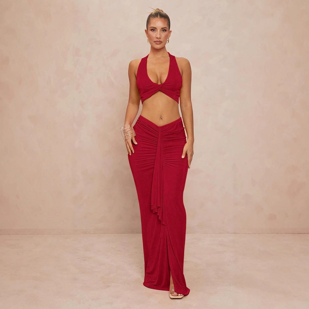 Elegant damesbodysuit med kryssrygg og sidesnitt, perfekt som festtopp for kvinner.