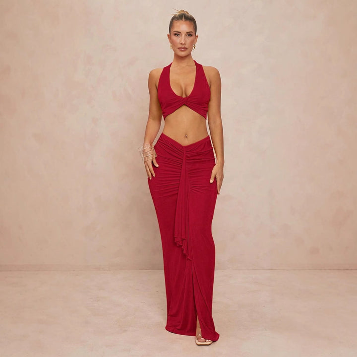 Elegant damesbodysuit med kryssrygg og sidesnitt, perfekt som festtopp for kvinner.