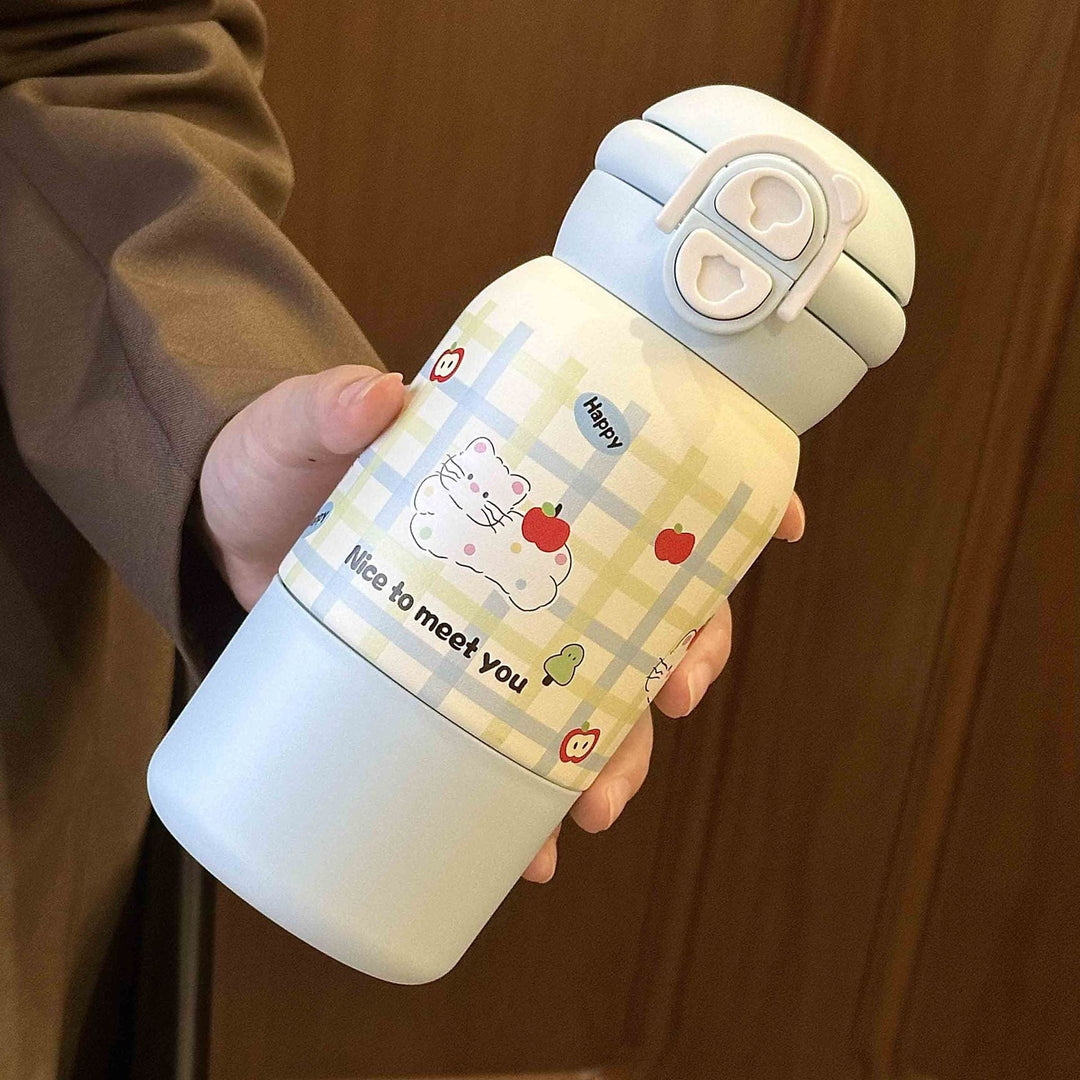 Kvinners isolerende drikkeflaske, 500ml, med praktisk klapplokk. Perfekt for reise og trening.