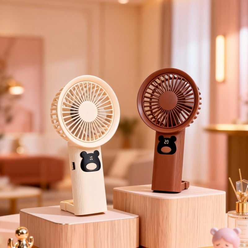Bærbar håndholdt vifte med søtt bjørndesign for kvinner, ideell for kjøling i sommer.