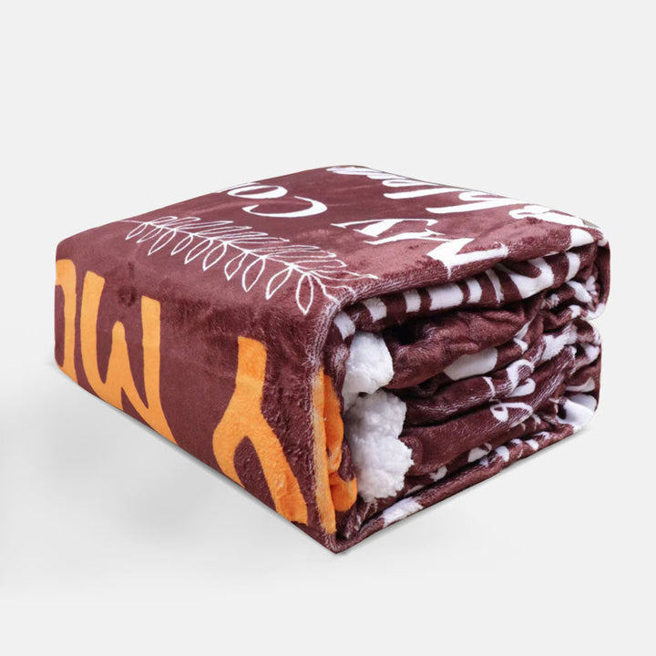 Elegant og mykt teppe for dame, ideelt for hygge på sofaen, som et soveromspledd eller gave.