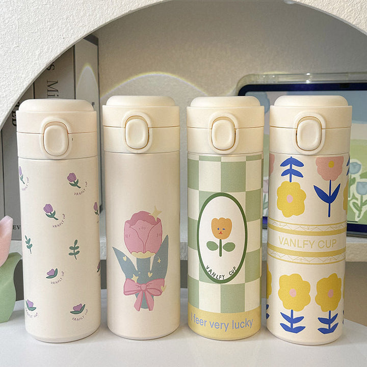 Dame isolert drikkeflaske, 500ml, med delikat blomsterdesign. Rustfritt stål, gjenbrukbar, perfekt for hverdagen.