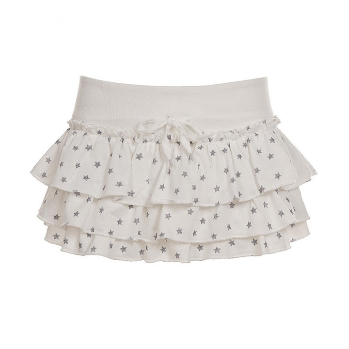 Dame sommerskjørt med stjernemønster og volanger. Elastisk midje for komfort og stil. Trendy og allsidig.