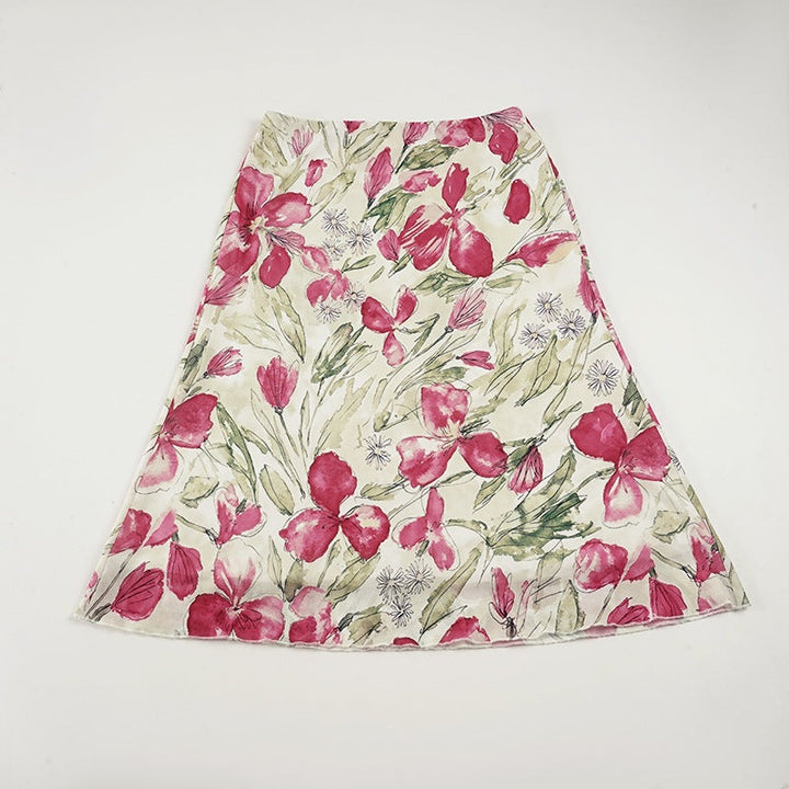 Dame elegant blomsterskjørt, svingende midiskjørt med unikt blomsterdesign for en sofistikert look.