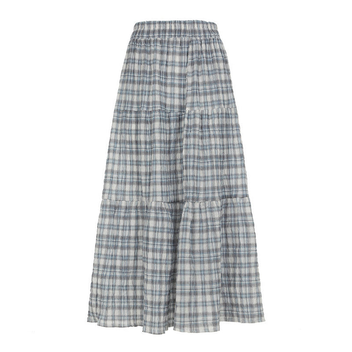 Elegant blått rutete maxiskjørt for dame, komfortabelt og flytende, perfekt for stilige hverdagsantrekk.