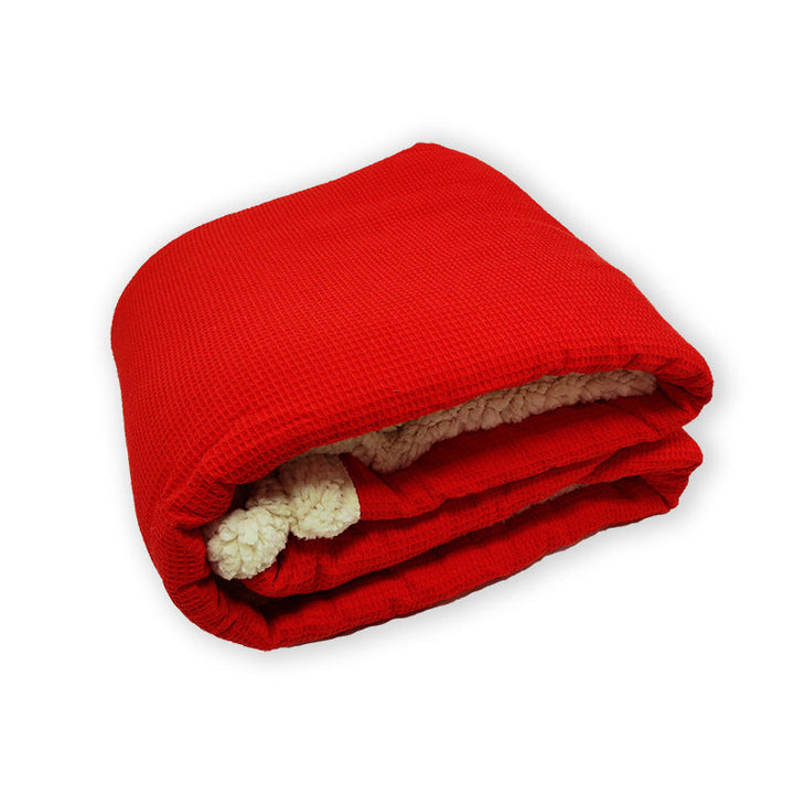 Komfortabelt damepledd i myk mikrofiber og fleece, ideelt som varmepledd eller interiørdetalj i hjemmet.