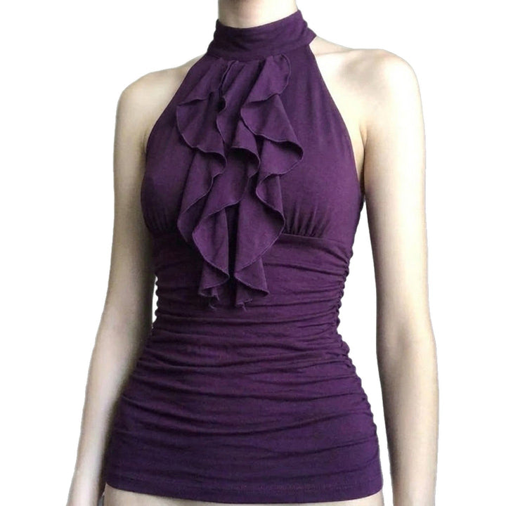 Vakker lilla halterneck topp med flere lag volanger. Flott for sommer og en chic look.