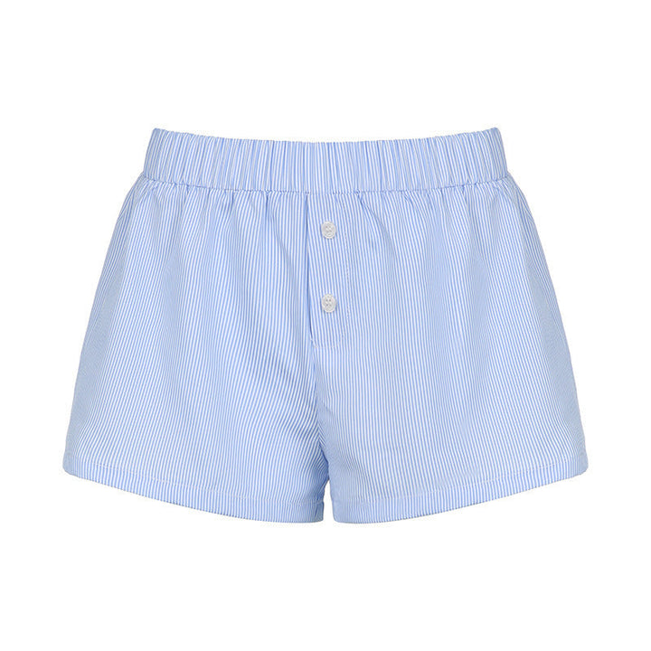 Allsidige blå dame shorts for sommer og fritid, med perfekt balanse mellom komfort, stil og funksjonelle knapper.