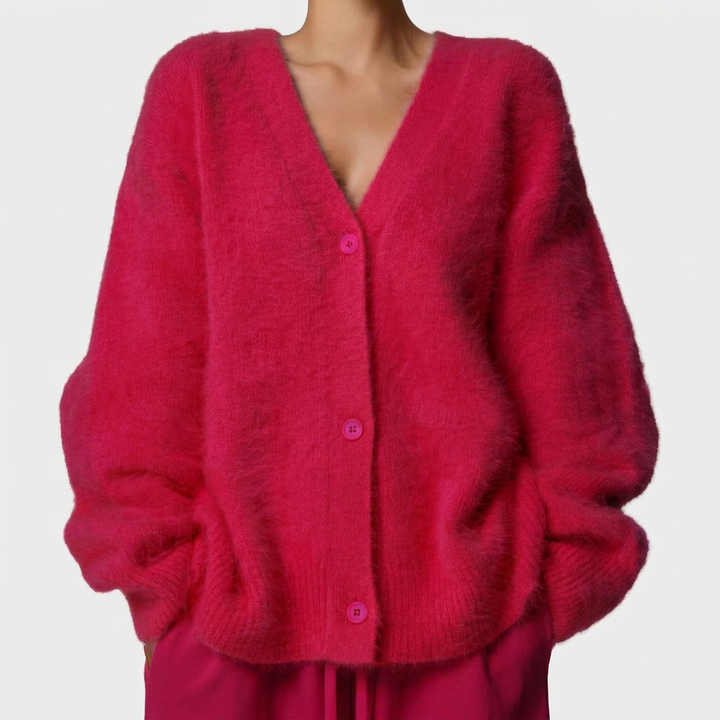 Dame v-hals cardigan med knapper, myk og stilfull. Komfortabel overdel for en avslappet hverdagslook.