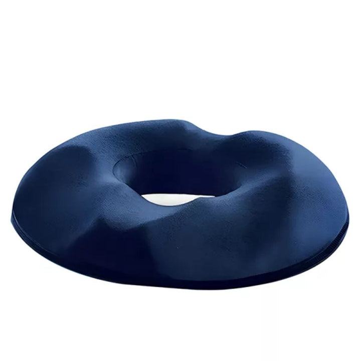 Ergonomisk donutpute i memory foam for trykkavlastning og komfort ved langvarig sitting.