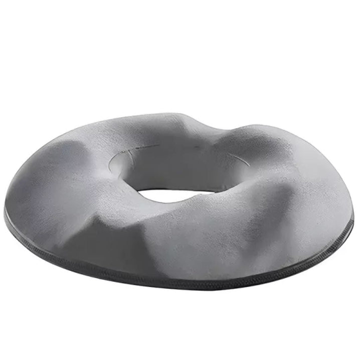 Donutformet avlastningspute i memory foam, gir trykkfri komfort og støtte for haleben og bekken.