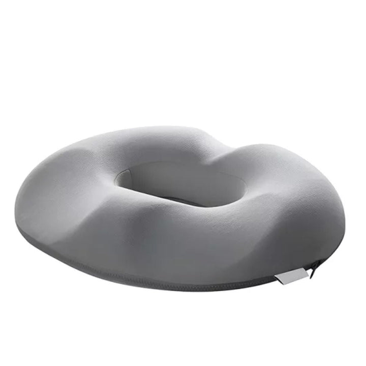 Helsefremmende ergonomisk pute i memory foam; lindrer halebeinssmerter og øker sittekomforten.