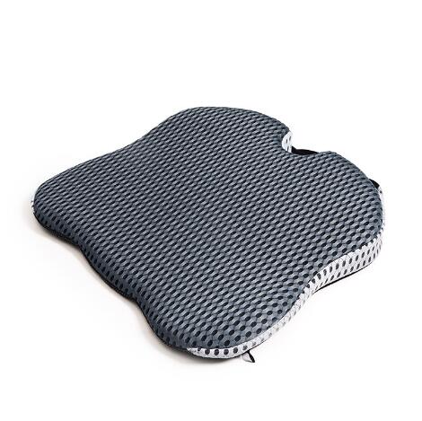 Nærbilde av myk, ergonomisk bilpute i memory foam, perfekt for lange bilturer, pendling og reiser.