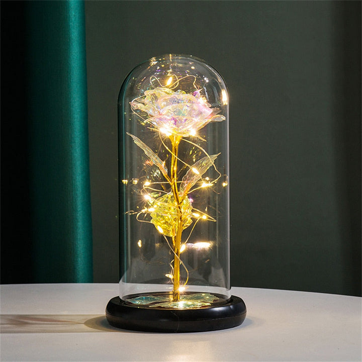 Evig rose med LED lys, innkapslet i glasskuppel; en hjertevarm jubileumsgave.