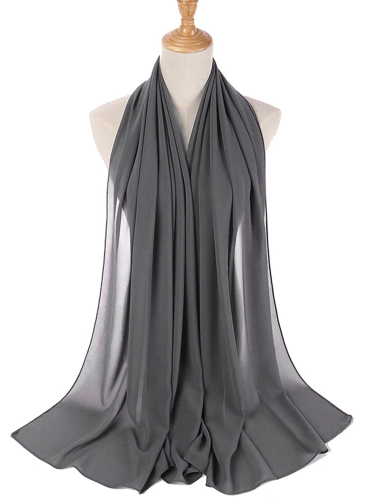 Mykt og behagelig chiffon sjal, perfekt for en sofistikert look.